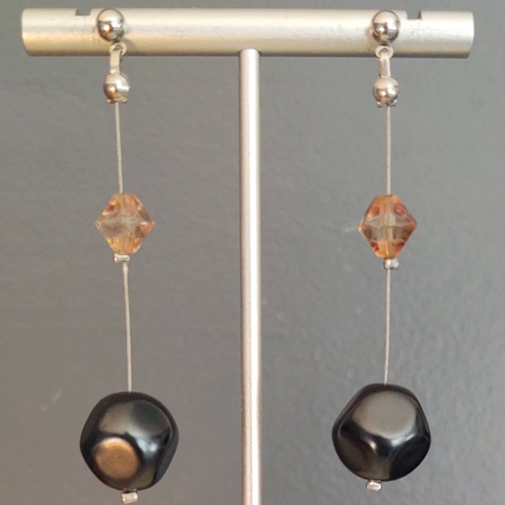 Pale cognac and black bead dangle earrings